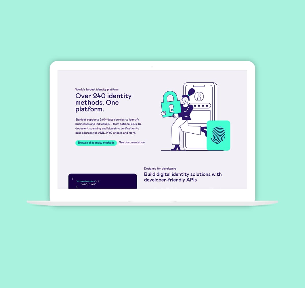 Signicat webpage displayed on a laptop sat on a green background.